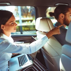 Businesswomen in limousine during a transer to Nice airport