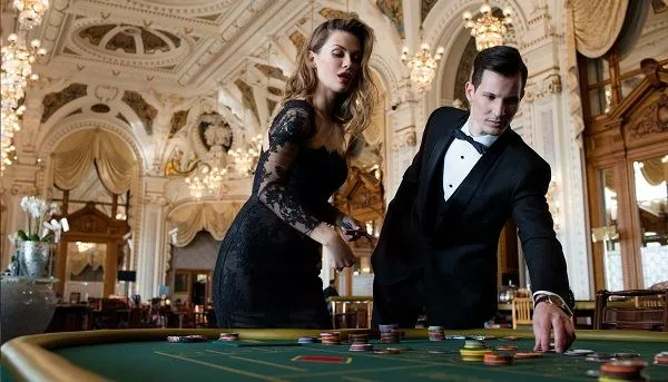 A couple gambling at the Monte Carlo casino