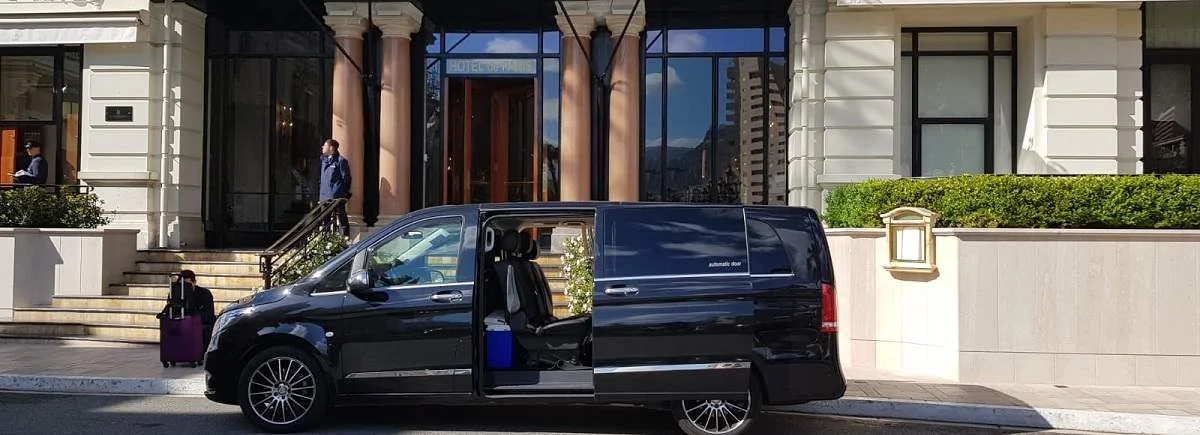 Van Mercedes vito dropping off customers in front of the entrance of the Hermitage Hotel in Monaco